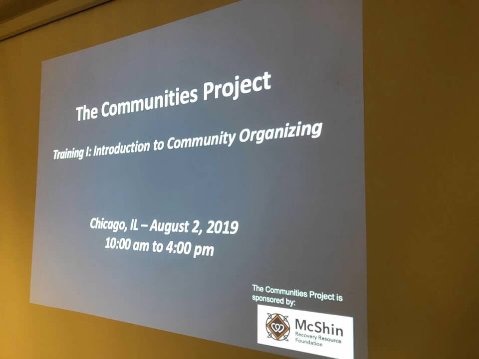 A slide from day one of the Communities Project, community organizing training.